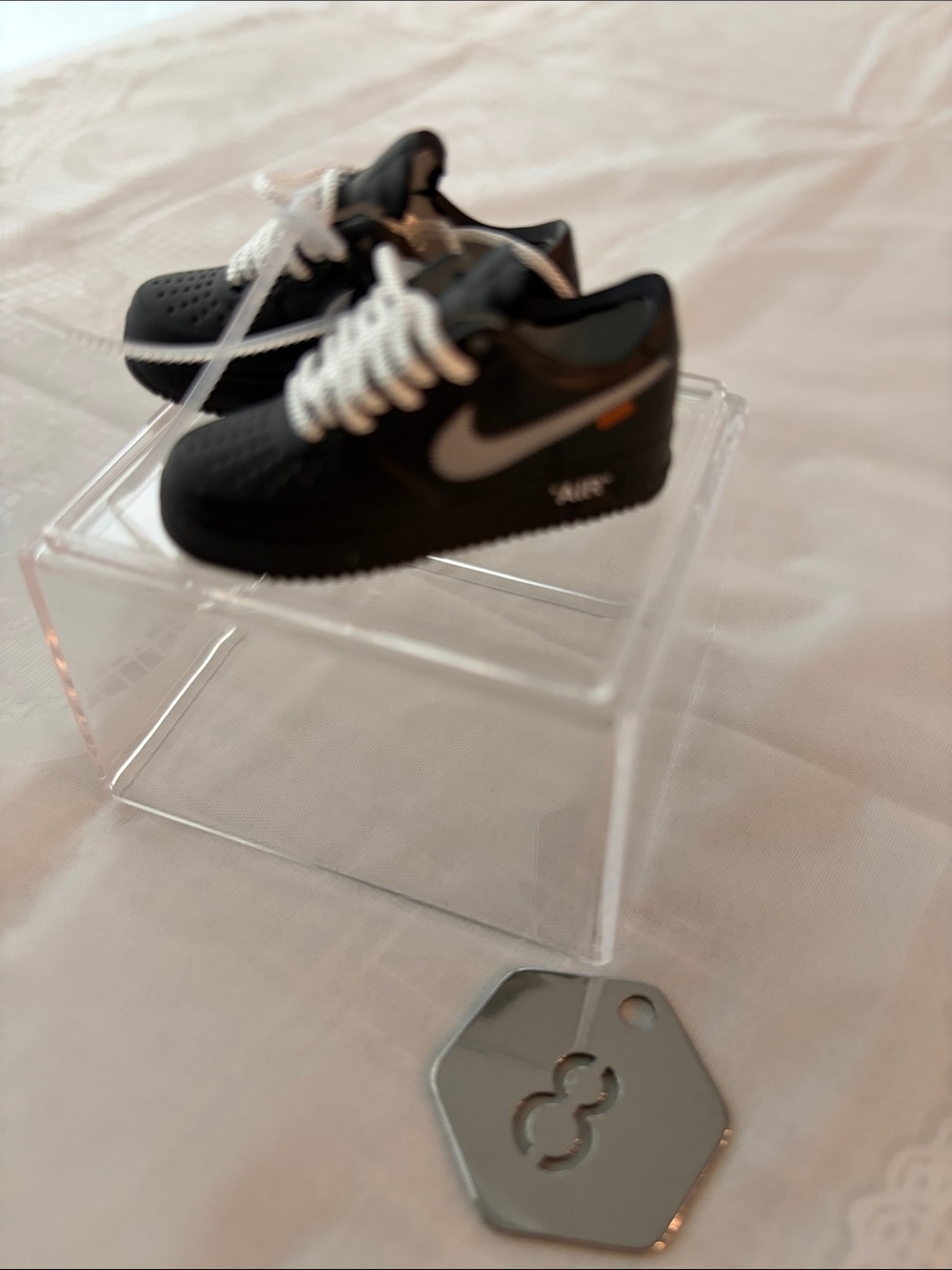 8, One Pair of Nike Black Mini Sneakers with White Nike Logo and Laces for Labub